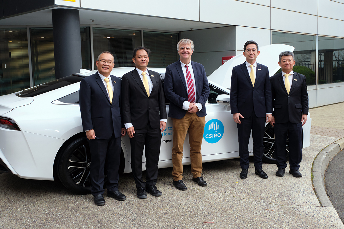 CSIRO and EGAT officials with a hydrogen powered car at CSIRO's Clayton facility in Melbourne