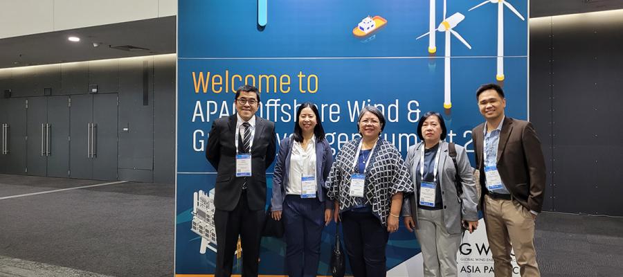 Group of people standing in front of the camera