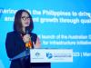 Australia Ambassador to the Philippines stands and gives opening remarks on the stage